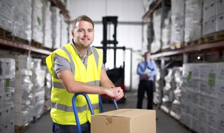 Warehouse Worker Using a Hand Truck